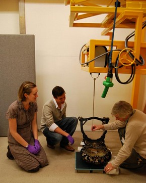 Figure 1 - Katy Smith and Alexander Jolliffe assist Paul Robins in an X-radiography