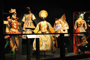 Figure 5 – Open display of five costumes from 'Chout' with a one metre high acrylic barrier and a false ceiling to protect objects. Photograph by Bhavesh Shah