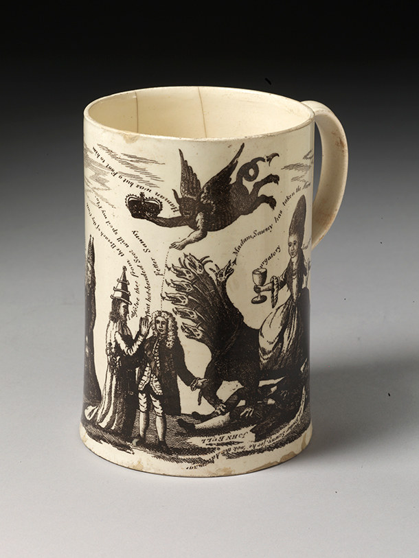 Quart mug showing demonic figures