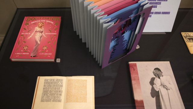 books and tunnel book in display case