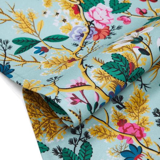 A detail of a floral blue fabric.