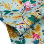 A detail of a floral blue fabric.