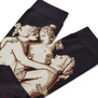 A detail of a pair of black socks featuring an illustration of Canova's Three Graces sculpture group.