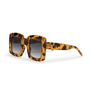 Side view of a pair of square sunglasses with a leopard printed frame and dark gradient lenses.