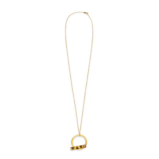A pendant necklace featuring a brass chain and round pendant.