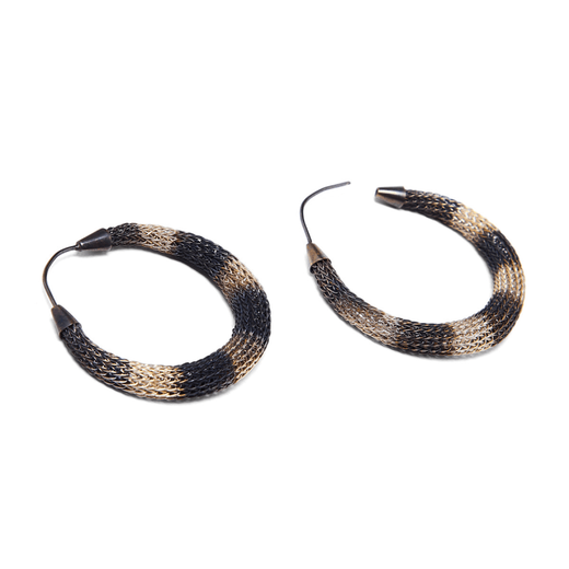 A pair of hoop earrings made with a silver mesh.