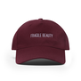 Front view of a maroon baseball cap with an embroidered purple text spelling 'Fragile Beauty' in capital letters.