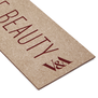 Detail of a brown bookmark featuring the V&A logo in purple letters.