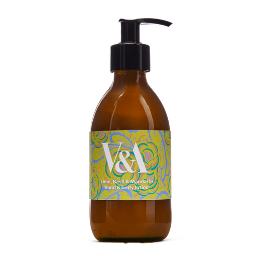 A brown glass bottle with a black pump and a green label. Printed on the label are a floral pattern and the V&A logo in white.