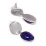 A pair of silver earrings each featuring an oval deep blue stone.