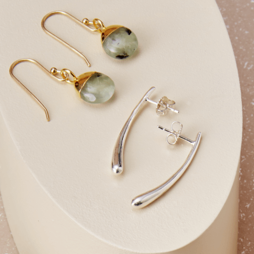 Silver teardrop earrings by Mounir