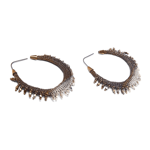 A pair of beaded hoop earrings in a gradient of silver tones.