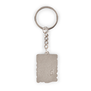 The back of a keyring in silver coloured brass. 