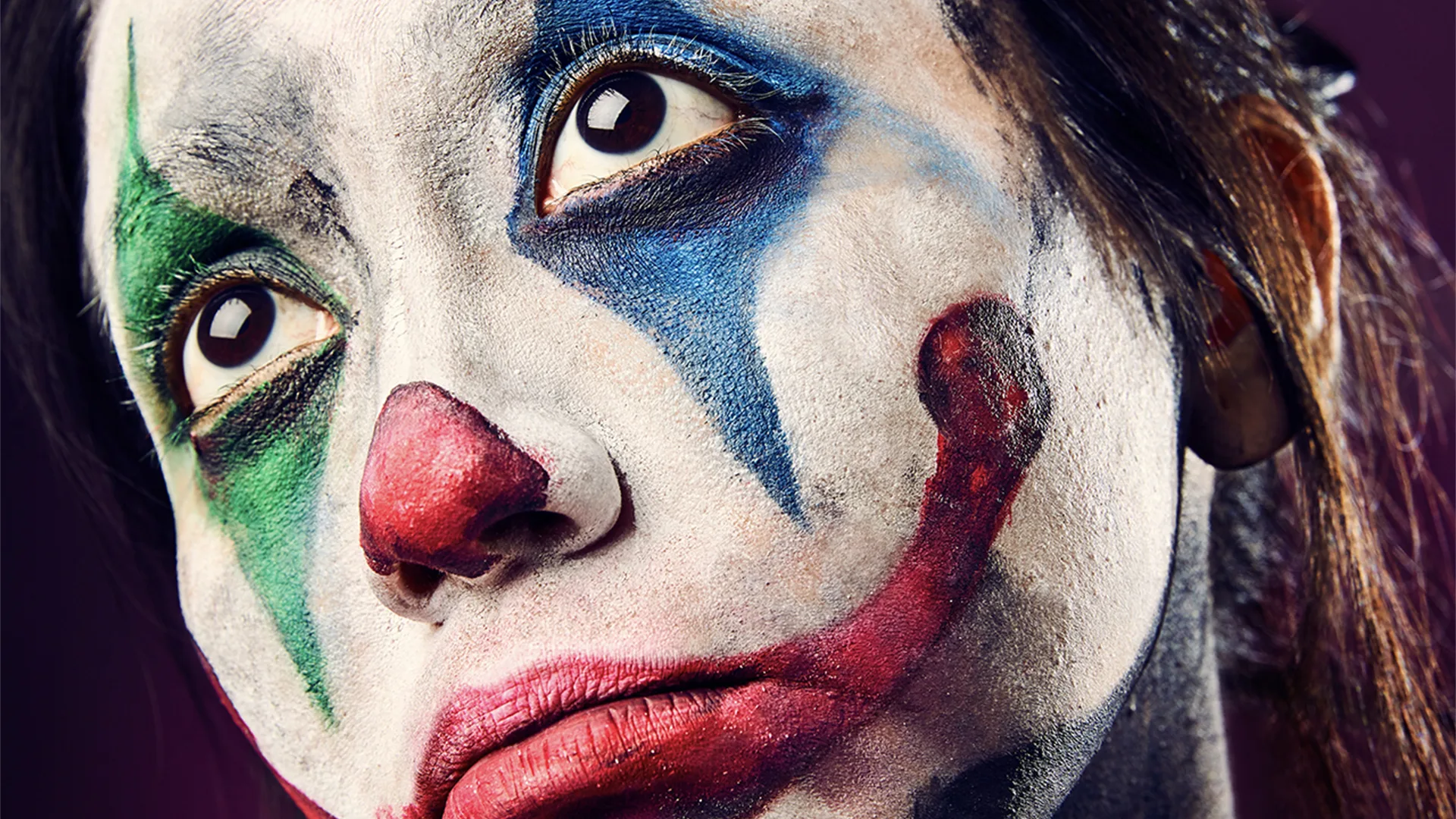 Closeup of a sad clown face