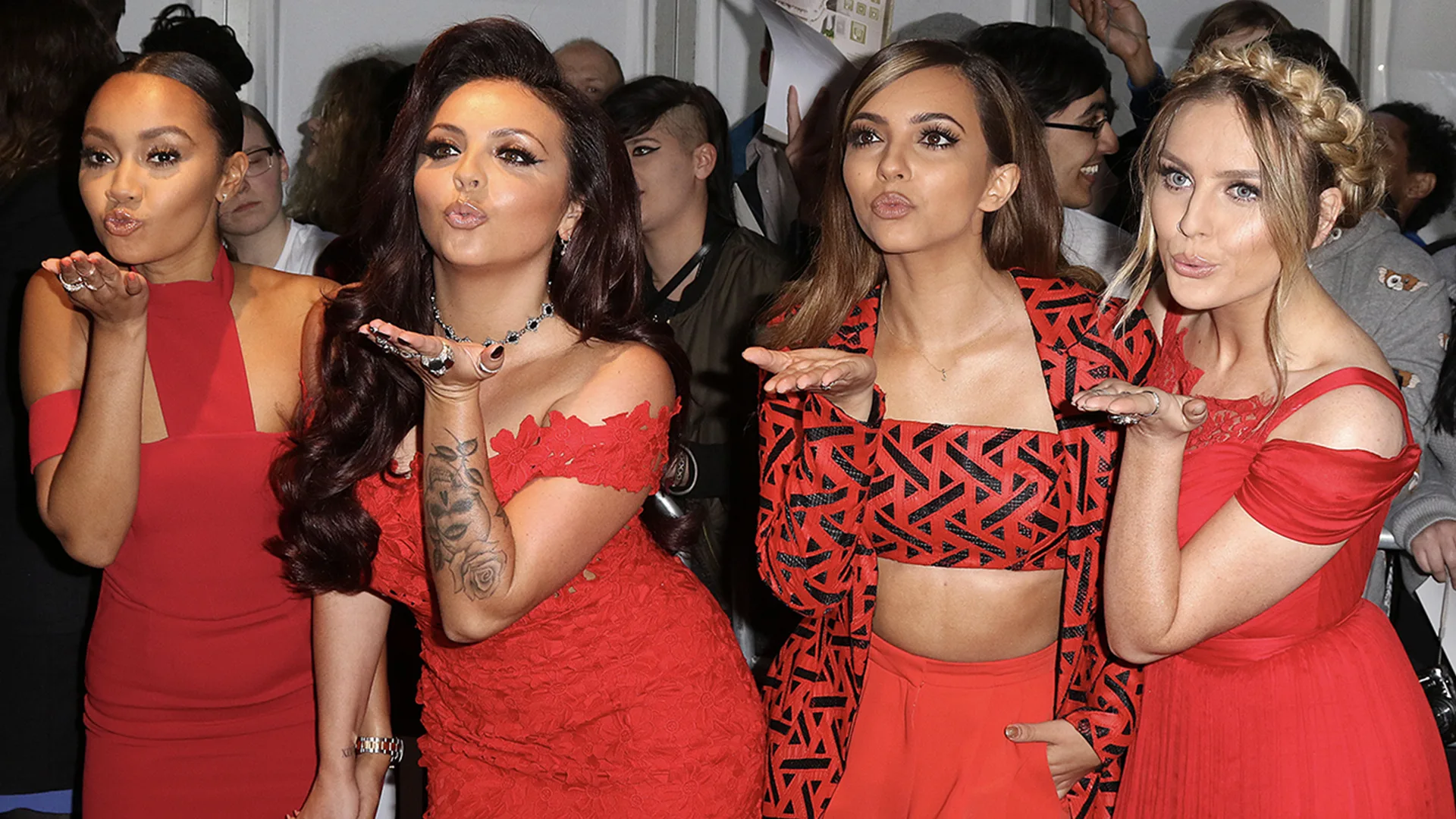 Little Mix all in red blowing a kiss