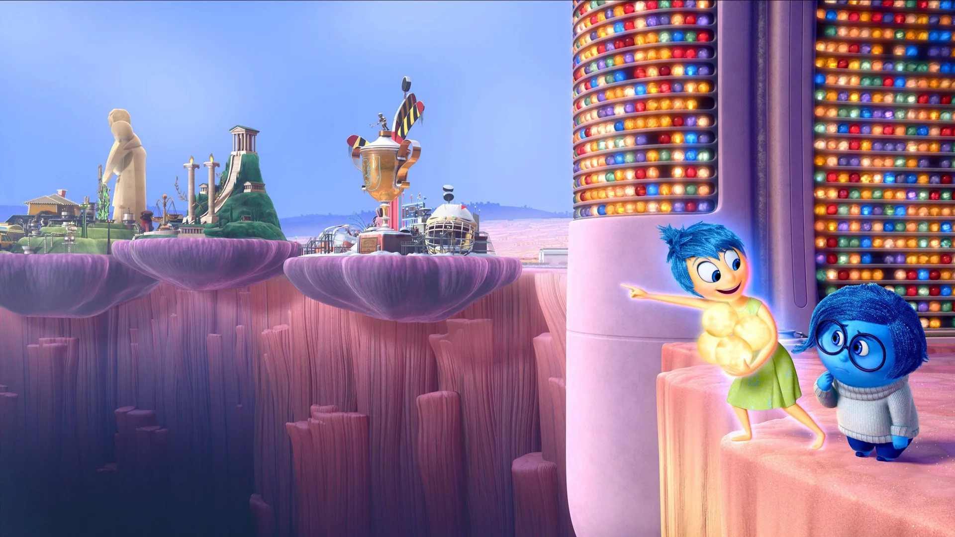 A scene from the Disney/Pixar film Inside Out showing Joy pointing out to the core memories with Sadness