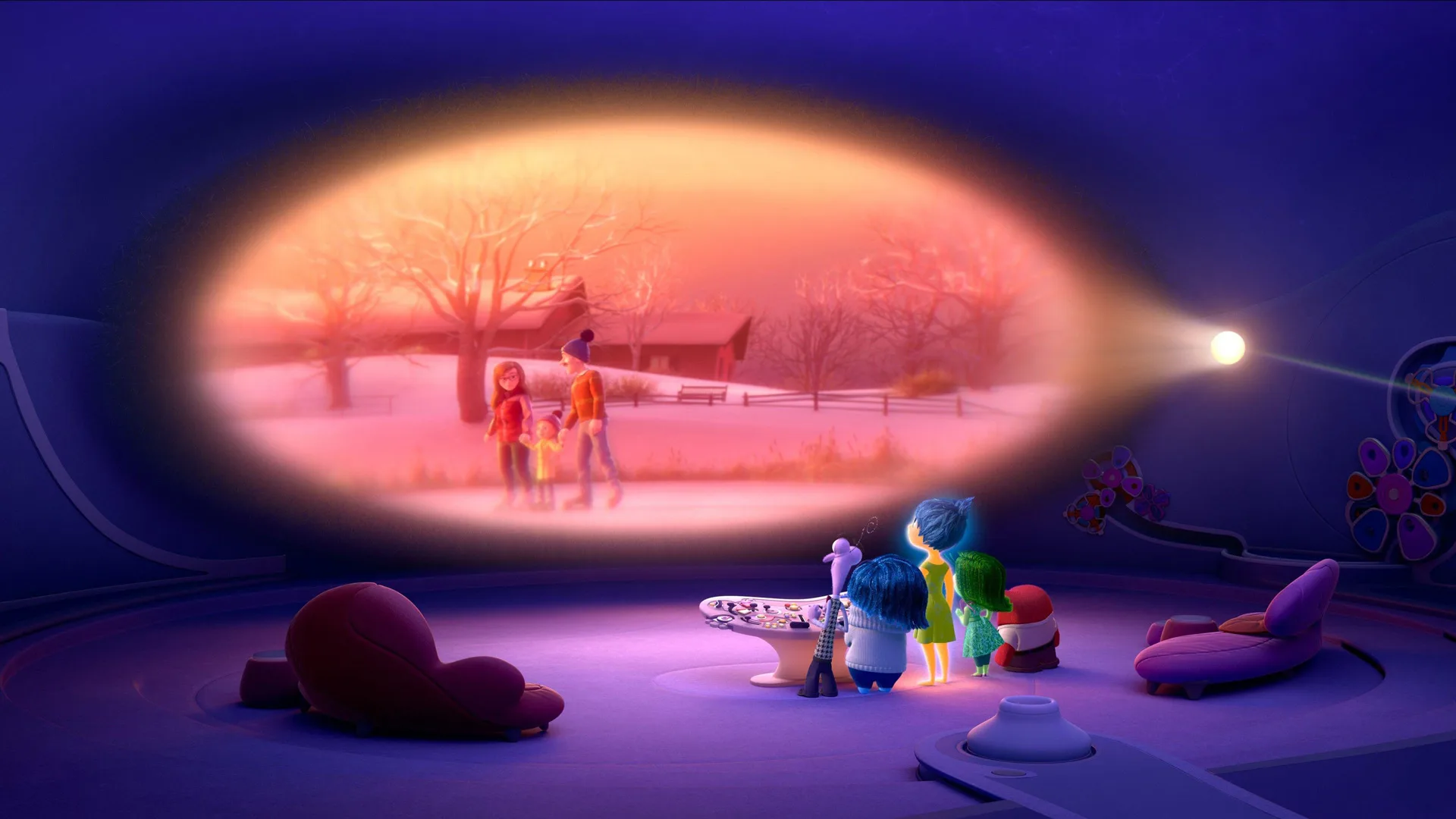 A scene from Inside Out showing the emotions rewatching a memory of the character Riley