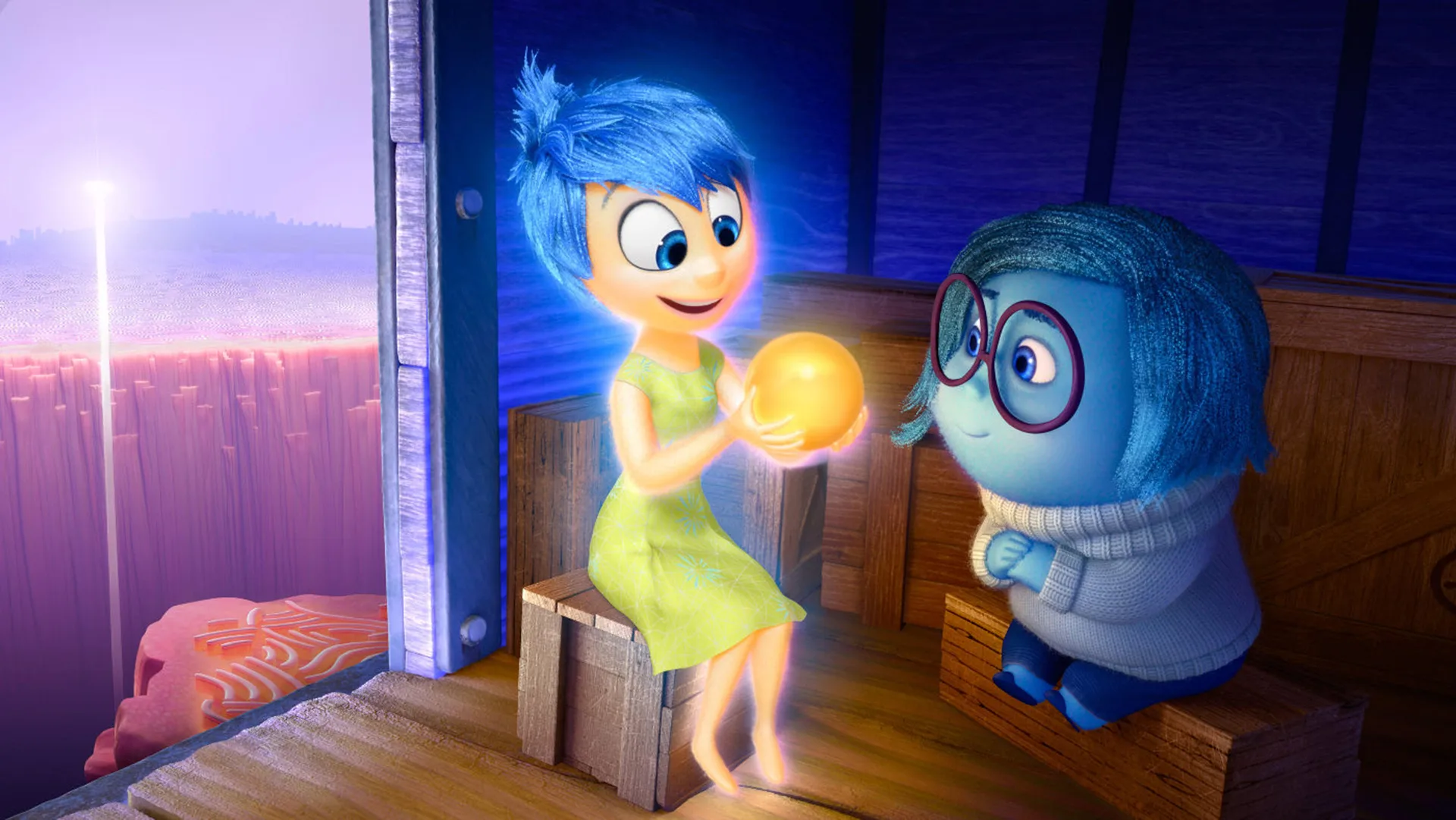 A scene from the Disney/Pixar film Inside Out showing the character Joy holding a happy memory orb and showing Sadness