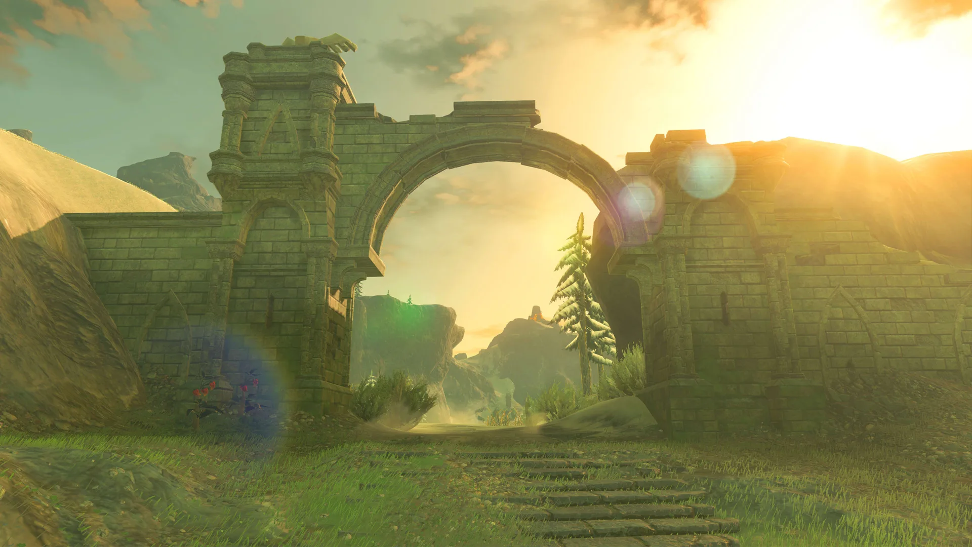 A scene from Zelda Breath of the Wild showing a bridge at sunset with trees in the background.