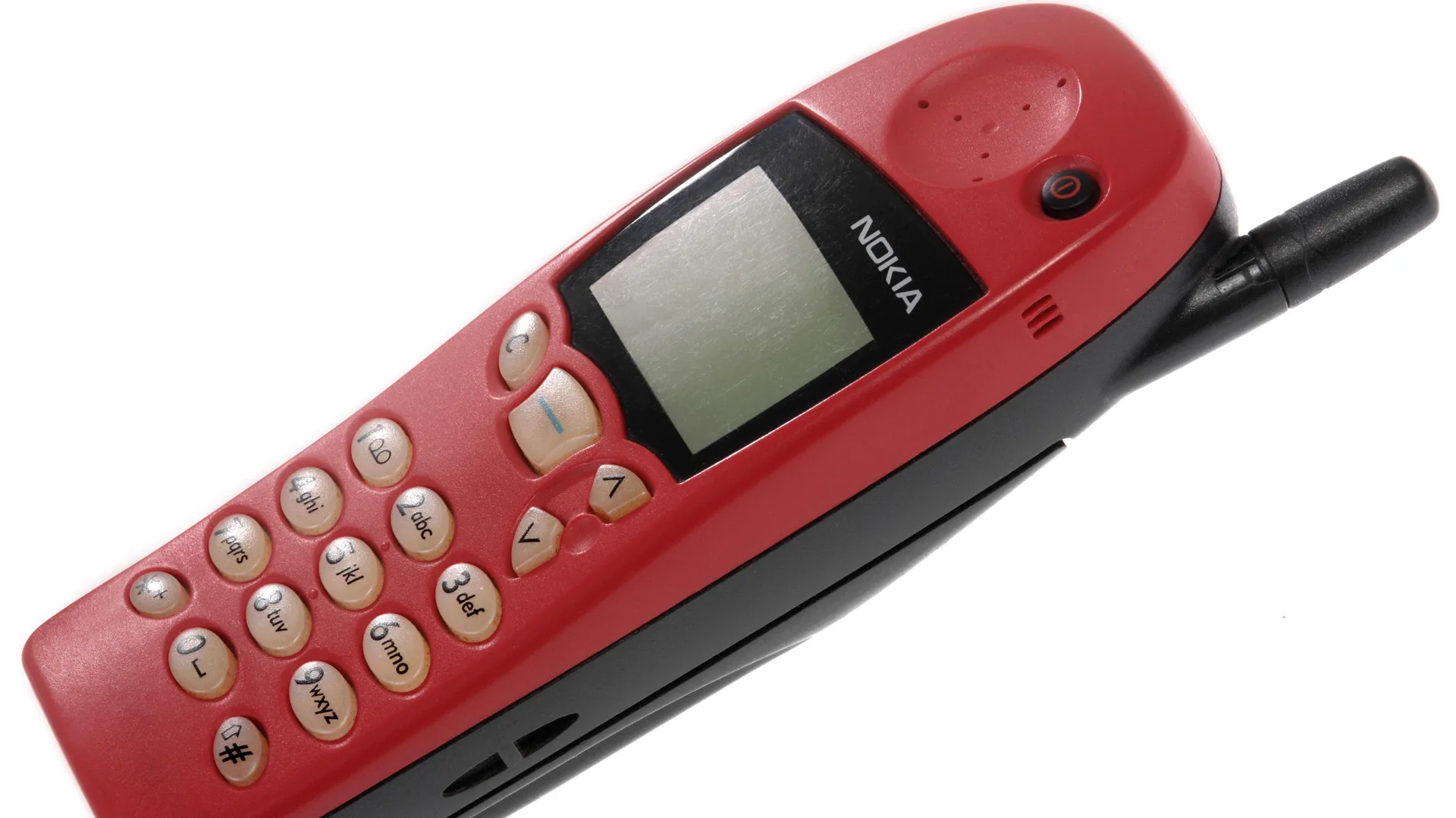 A photograph of the Nokia 5110 phone in red against a white background