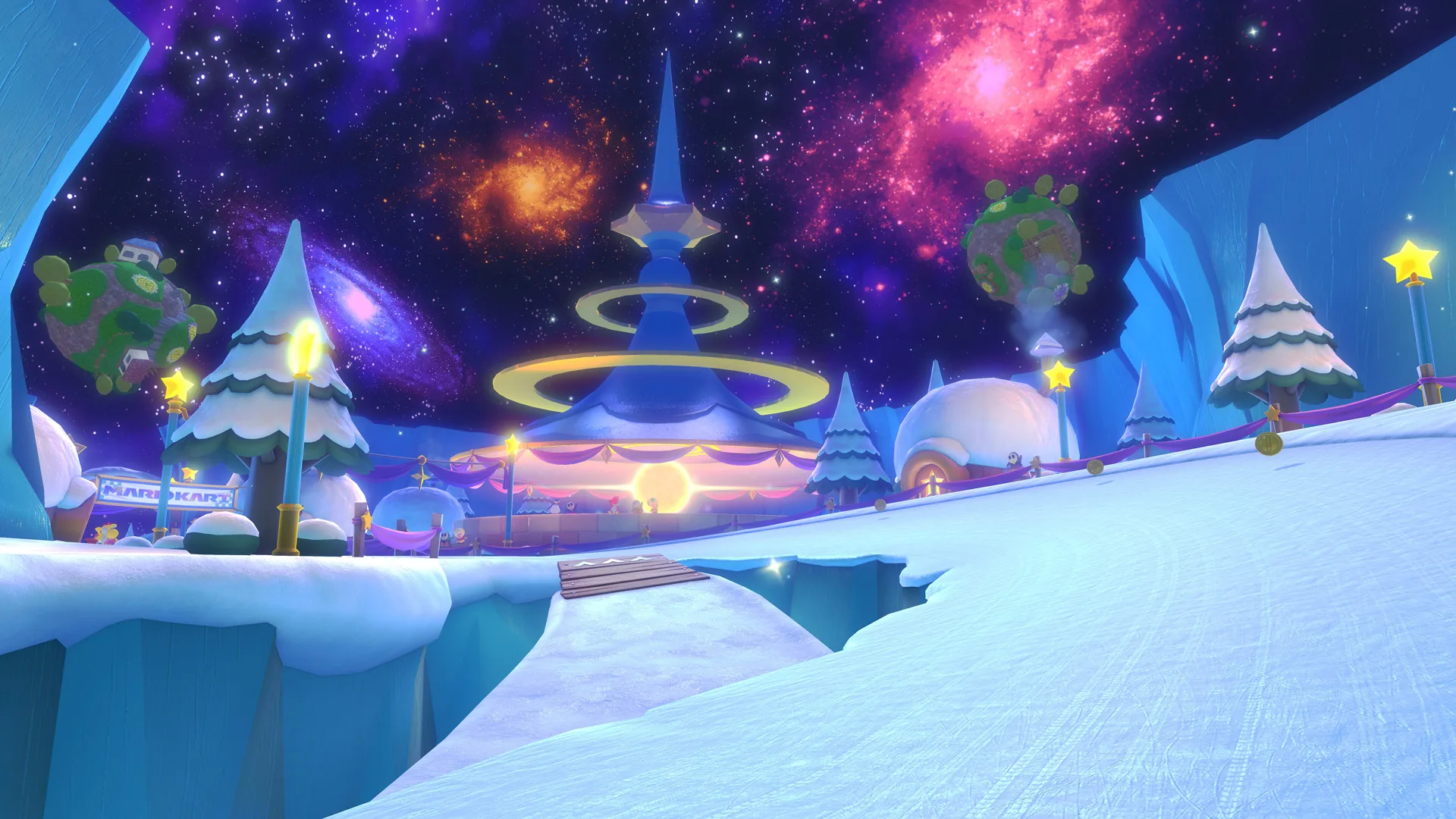 A still from Mario Kart showing the ice course with a futuristic building surrounded by ice against a night sky with galaxies and stars