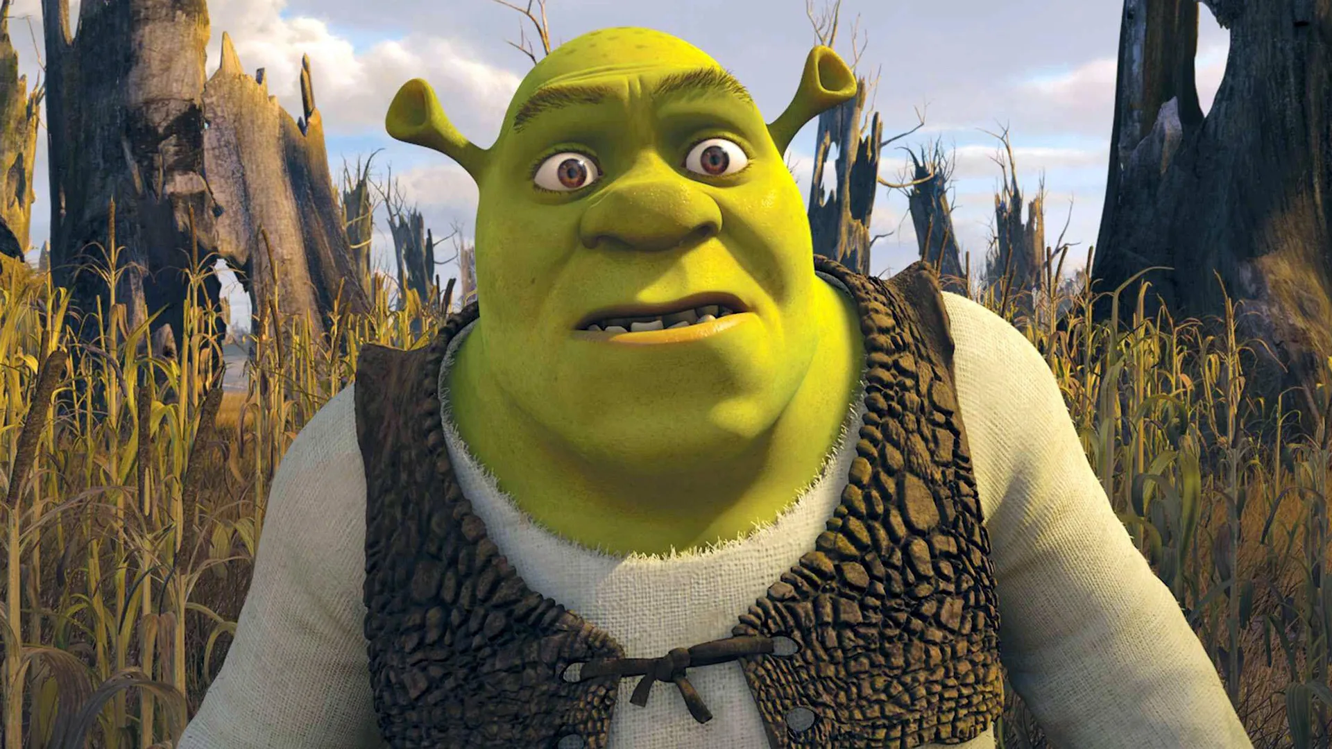 A still from Shrek 4 showing Shrek looking surprised at something against a cornfield