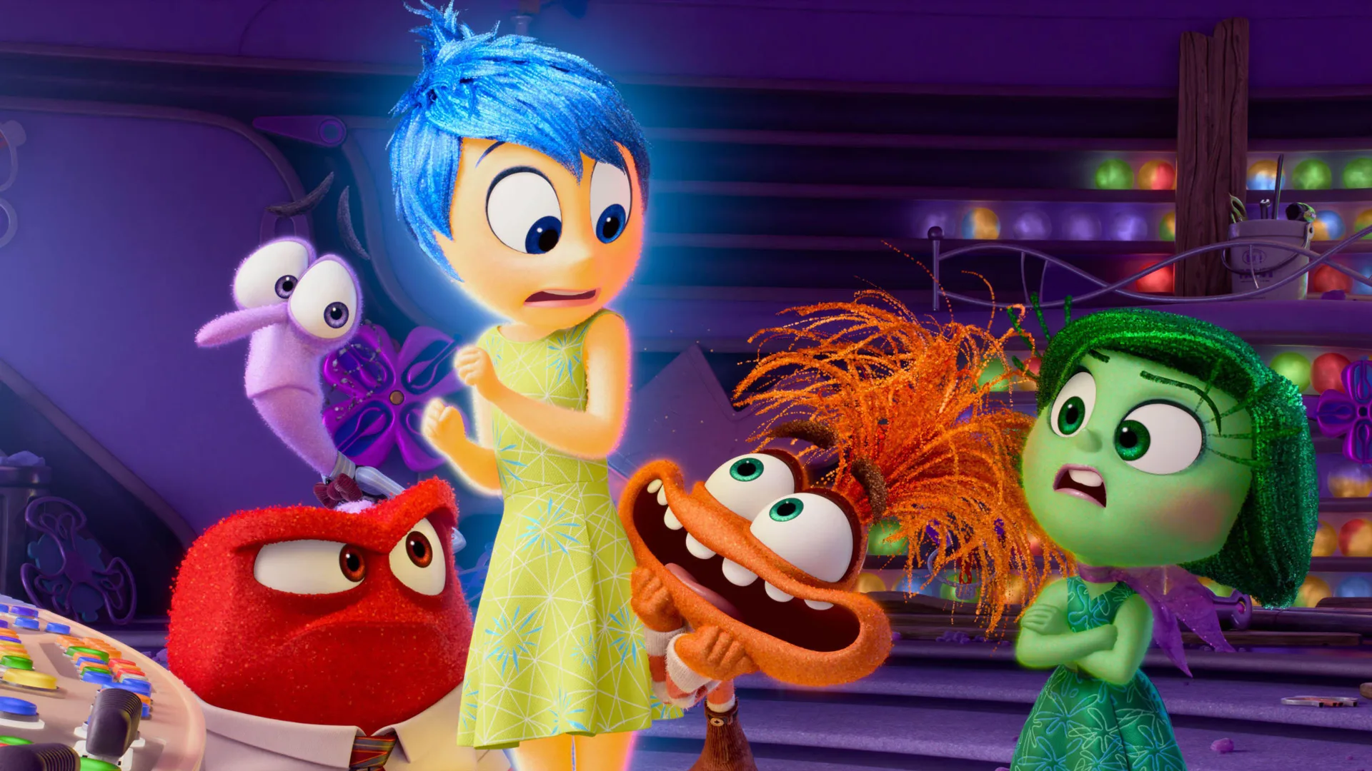 A still from Inside Out 2 showing Joy, Fear, Anger and Disgust meeting Anxiety in the control room