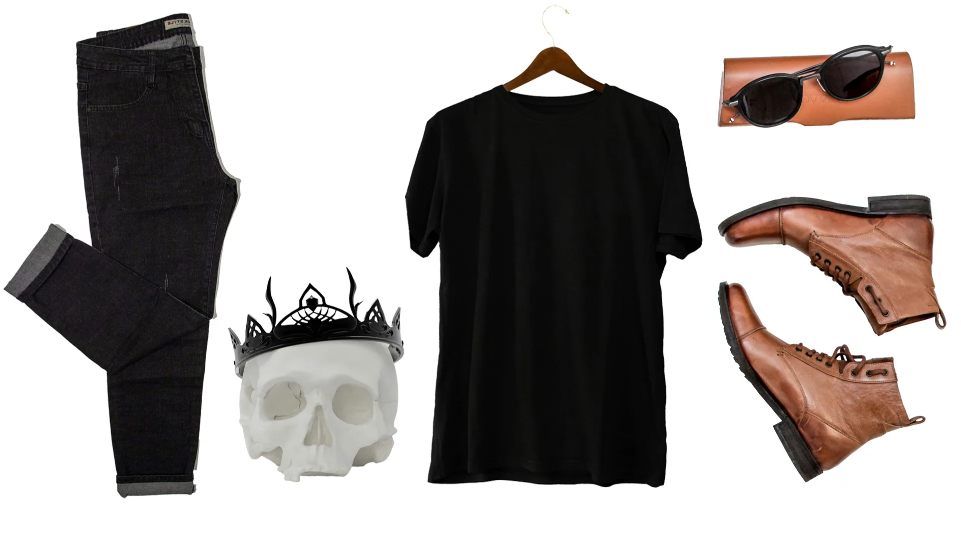 A photo of black jeans, a skull with a black crown, a black t-shirt, brown boots and sunglasses with a brown case against a white background