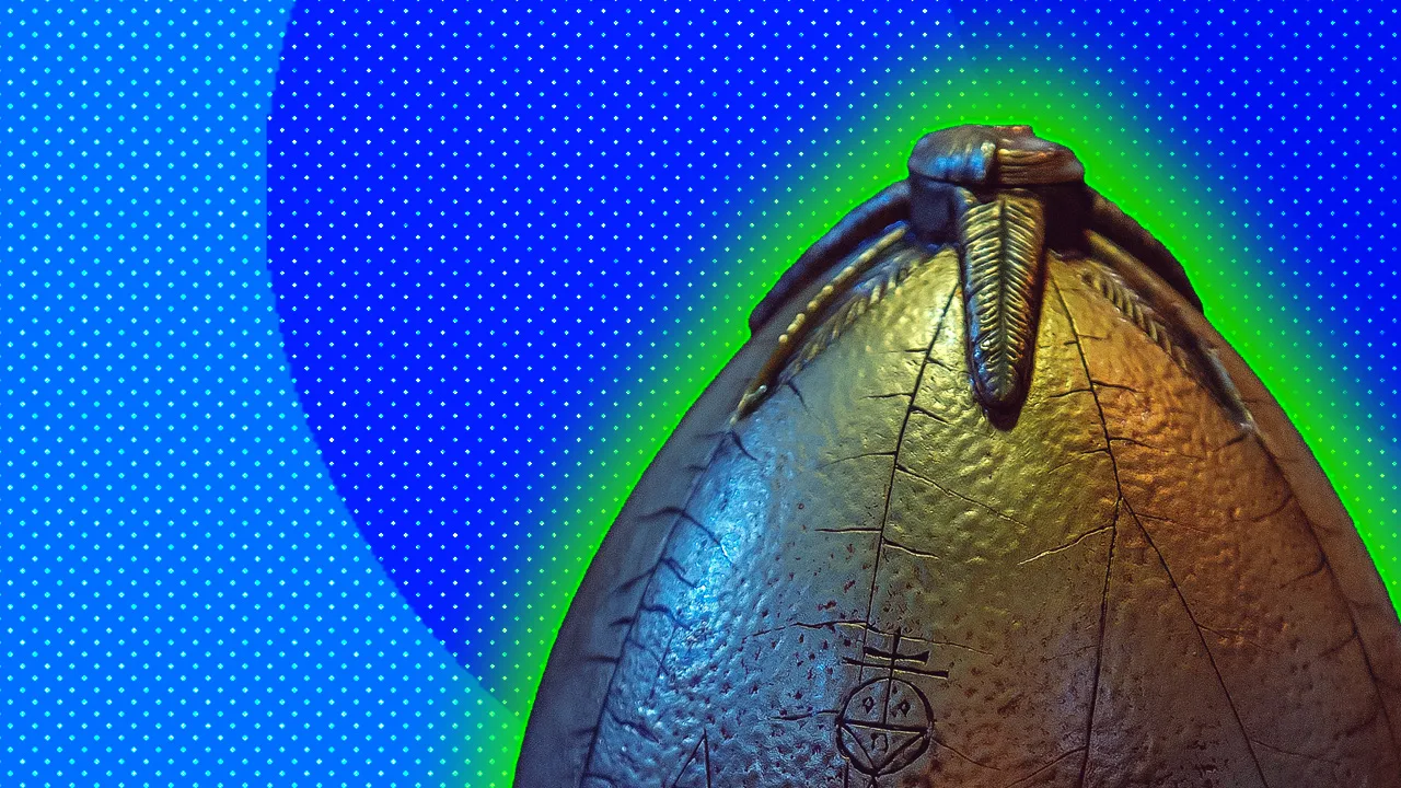 A photo of the singing egg from Harry Potter with a green halo against a blue dotted background.