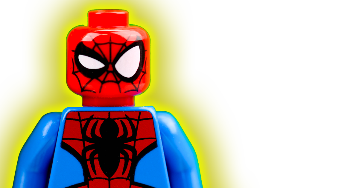 A photo of a LEGO spiderman with a suspicious expression surrounded by a yellow halo.