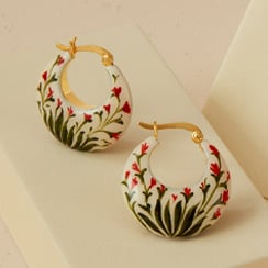 Enamel handpainted earrings with a floral pattern.