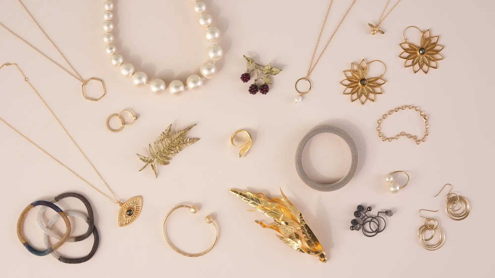 Shop designer necklaces, bracelets, earrings, brooches and rings at the V&A Shop