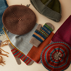 Scarves, berets and mittens of various colours and patterns.