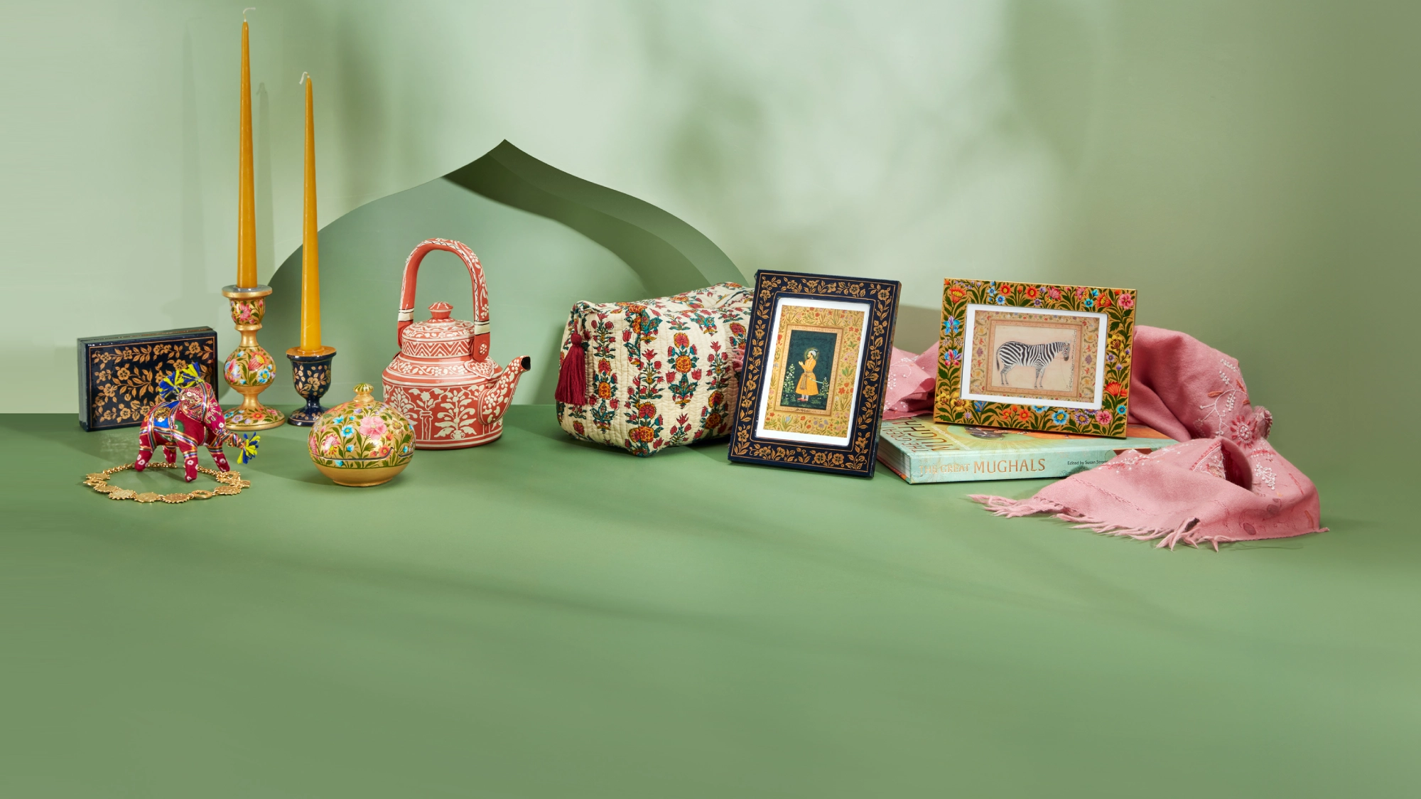 A selection of ornate homeware and fashion featuring block printed textiles, handpainted homeware and fine jewellery